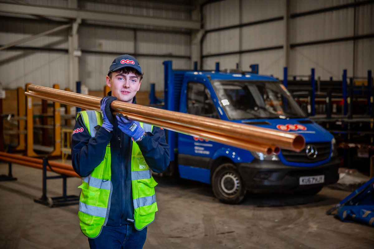 BSS Colleague Carrying Pipes