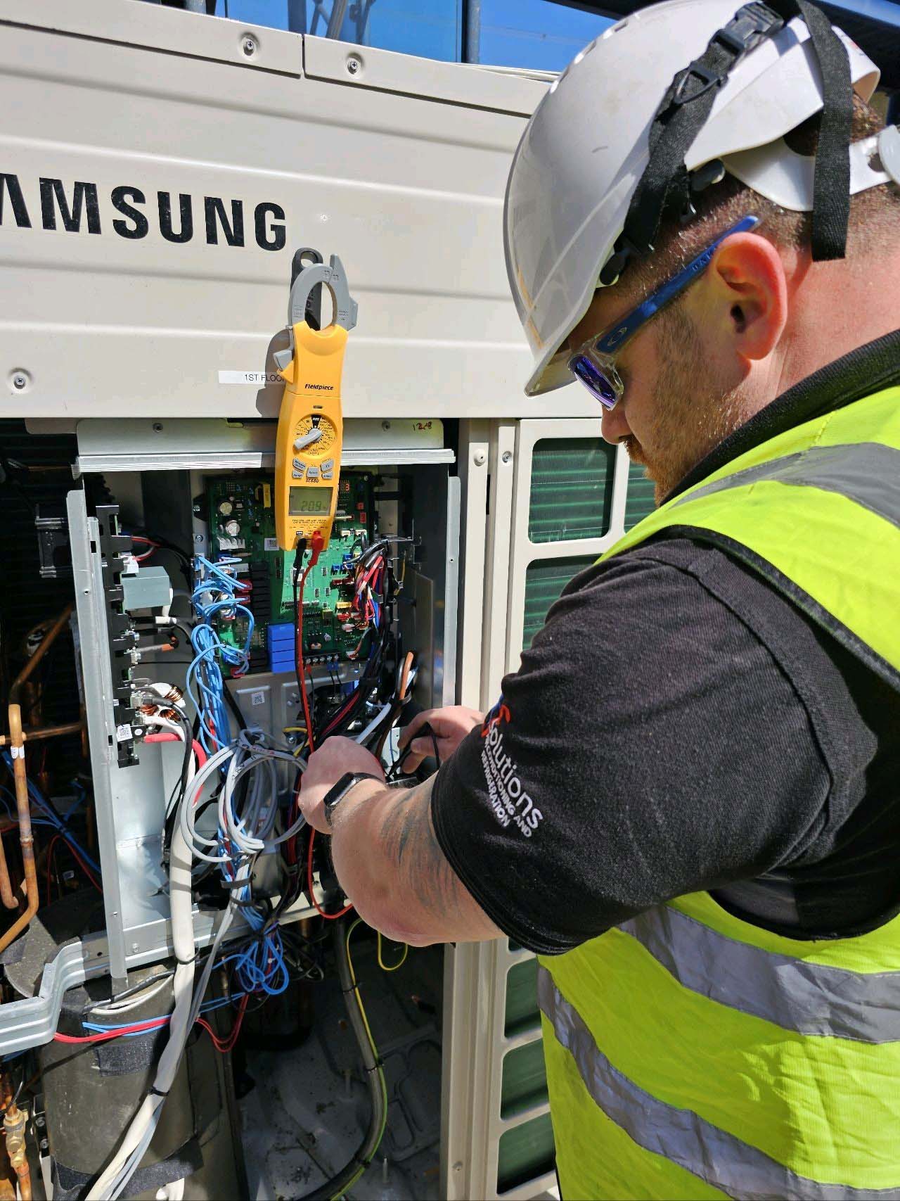 TF Solutions Colleague Working On Project
