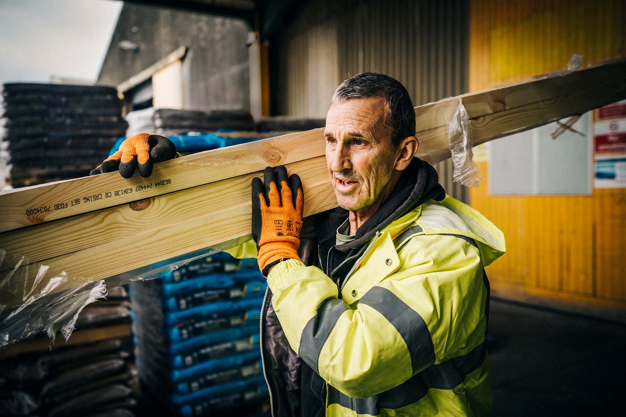 Colleague Carrying Timber